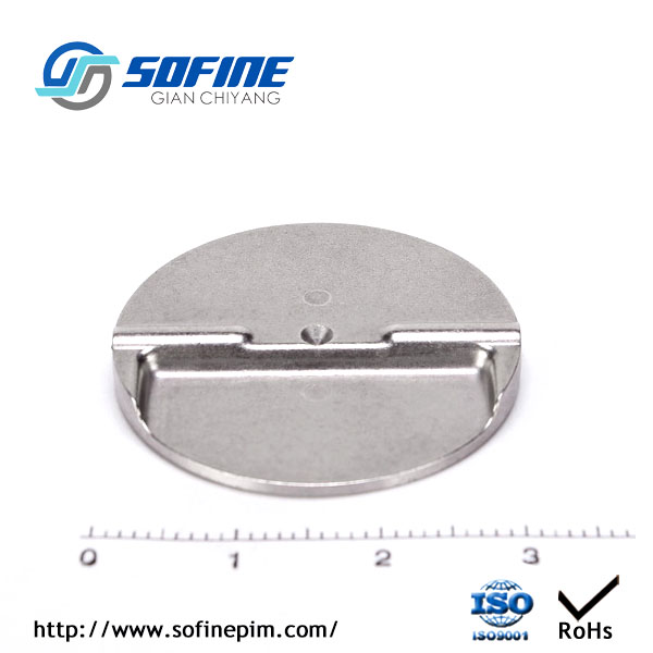 Metal powder injection molding exhaust baffle with sintering fixture